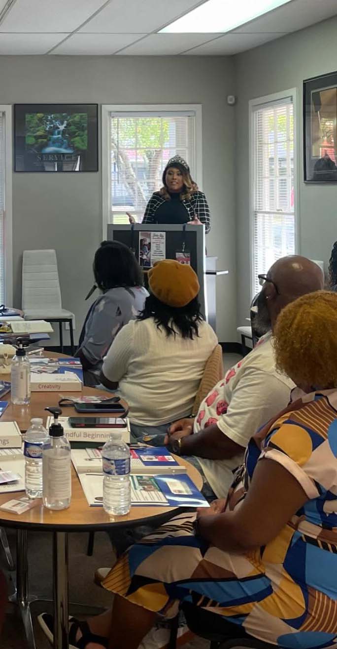 Caliah speaking at a conference